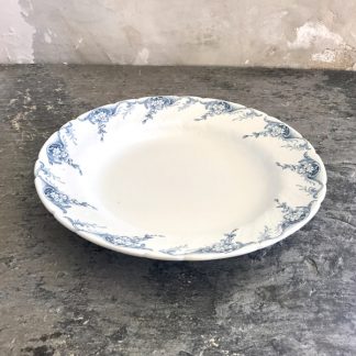 Grand plat rond en faïence de Lunéville