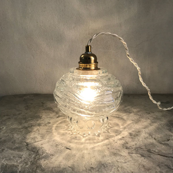 Lampe baladeuse globe vintage en verre transparent